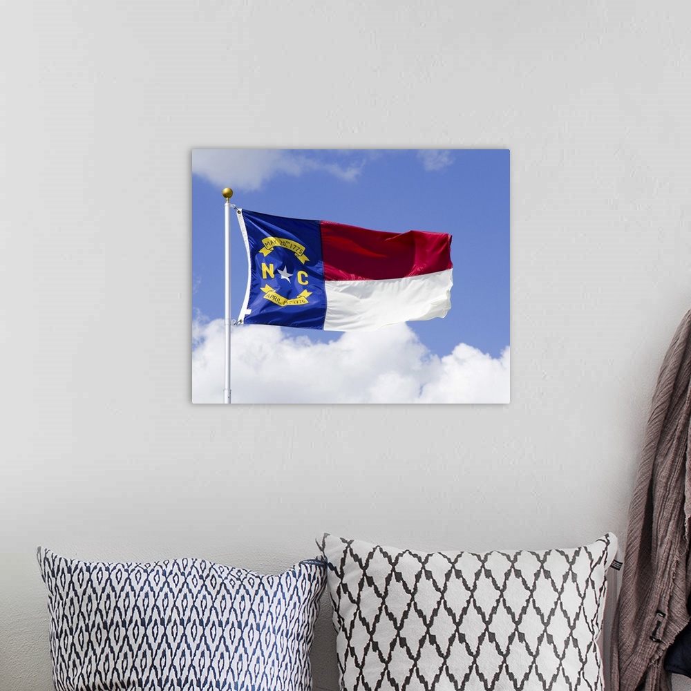 A bohemian room featuring North Carolina Flag