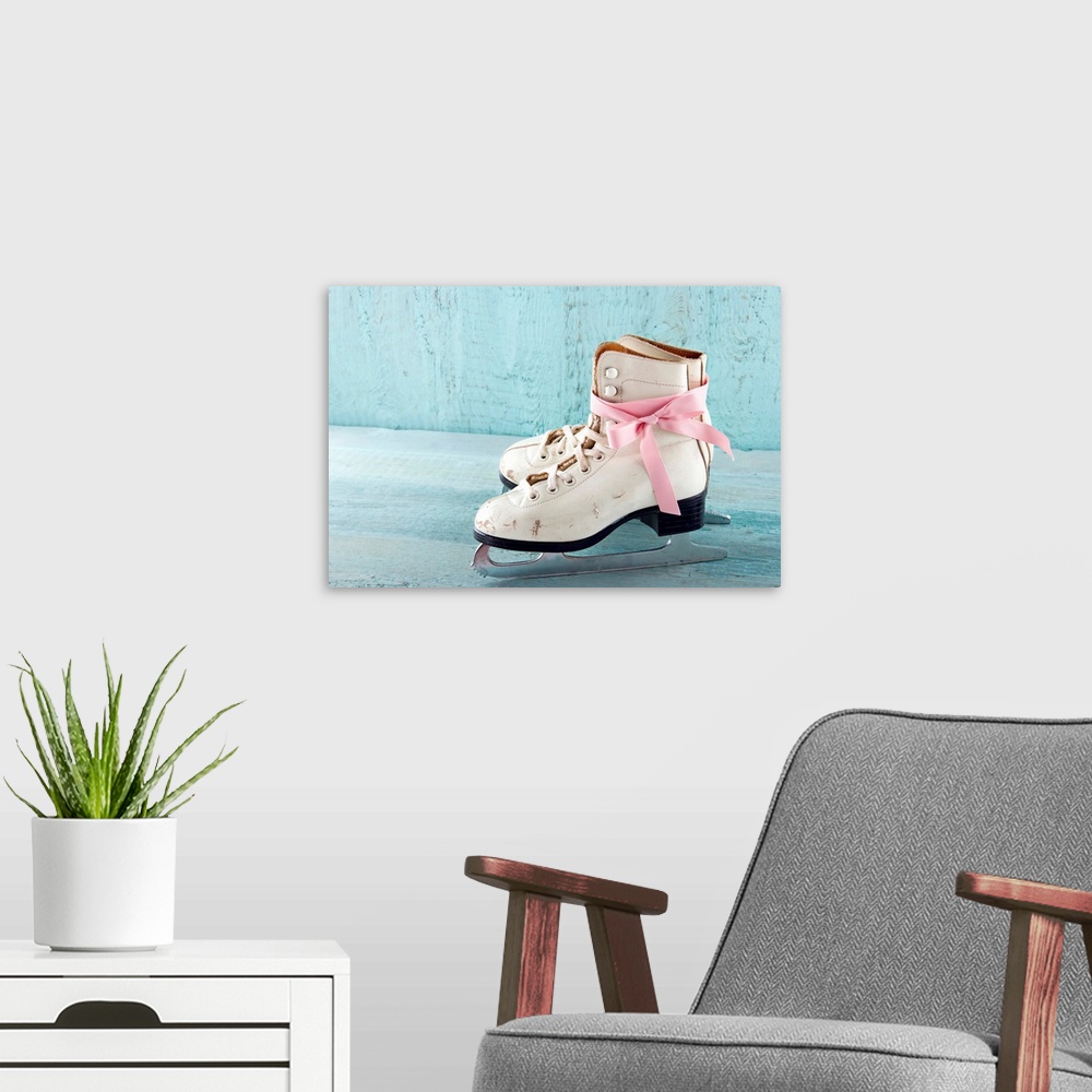 A modern room featuring Pair Of White Women's Ice Skates