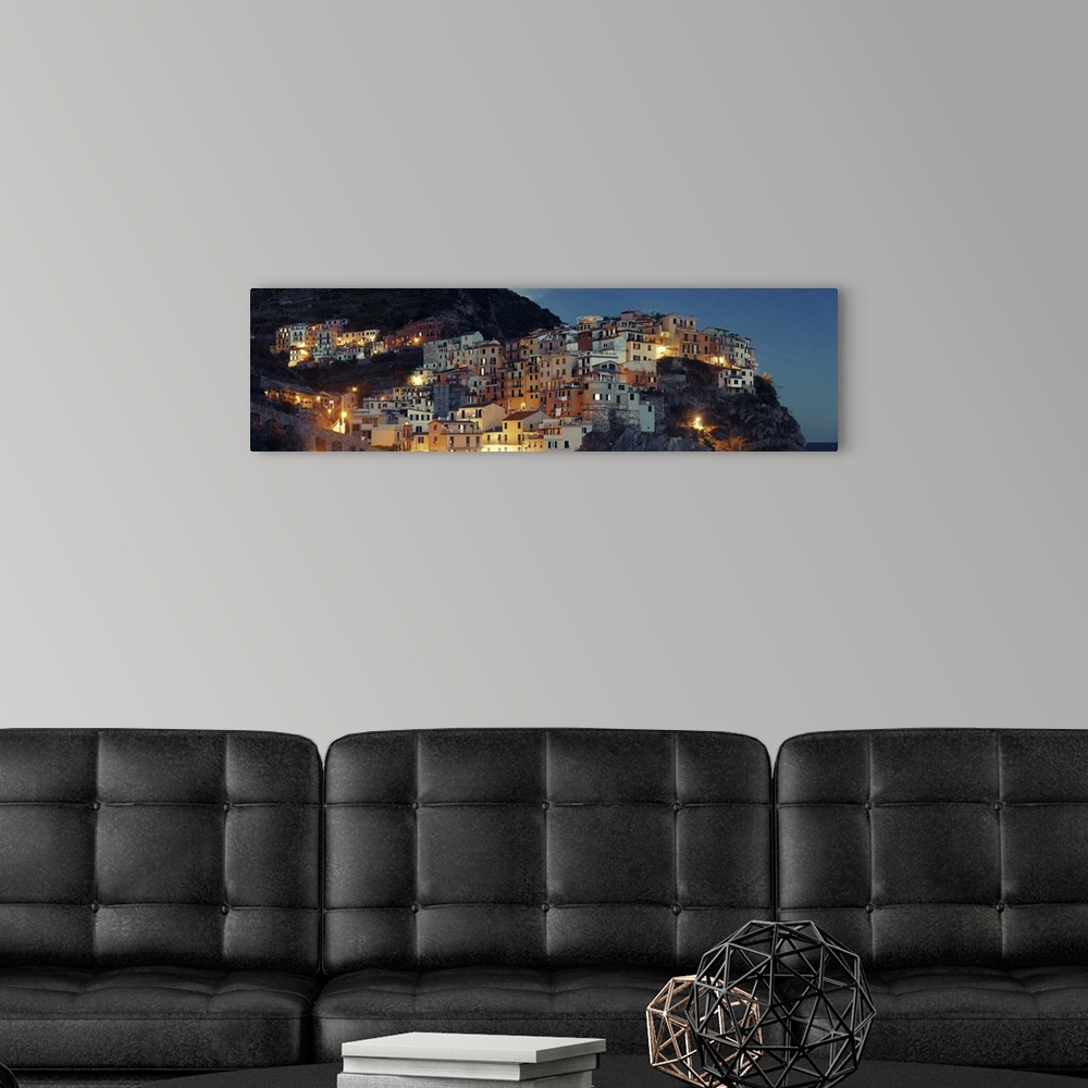 A modern room featuring Panoramic View Of Italian Buildings Over Cliff In Manarola, Cinque Terre, Italy