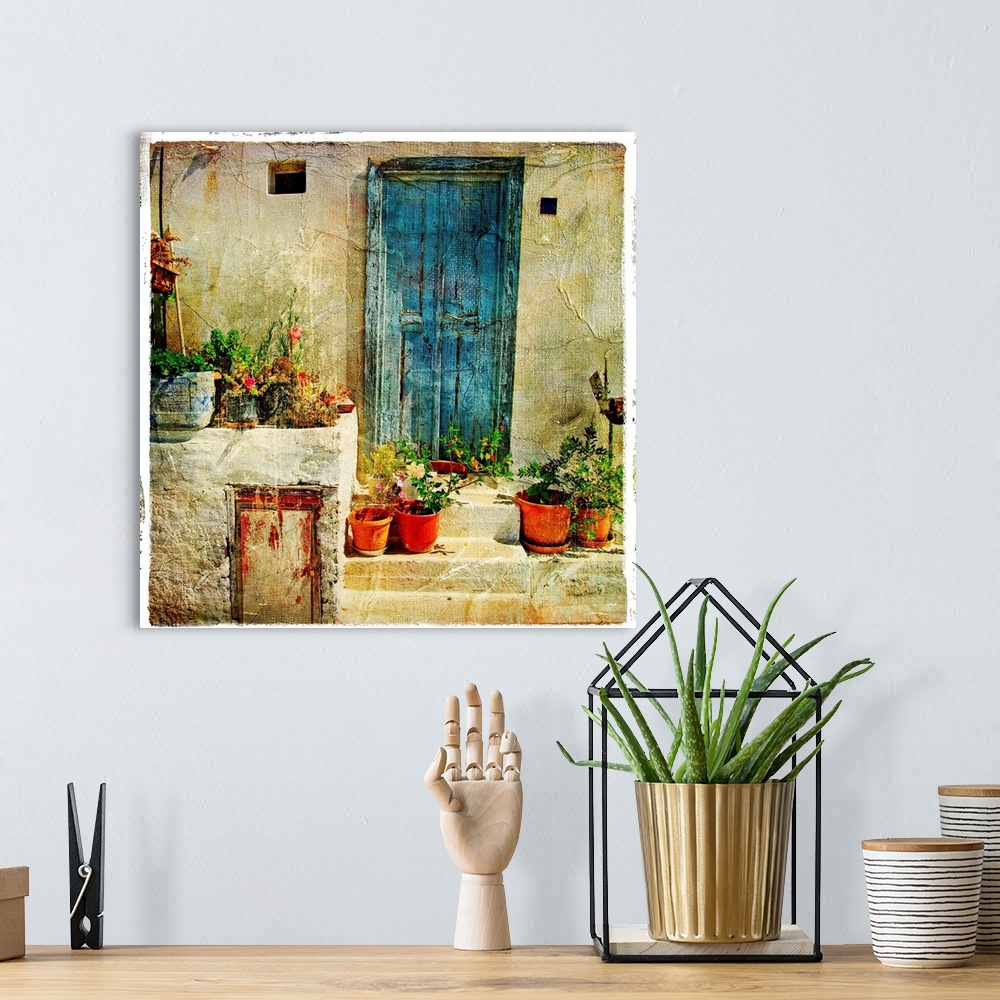 A bohemian room featuring pictorial Greek villages