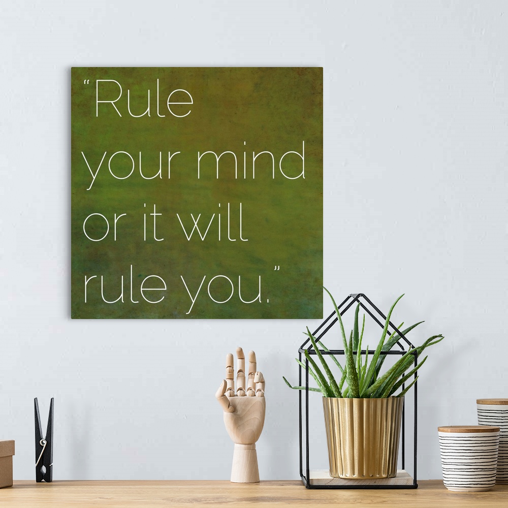 A bohemian room featuring Inspirational quote by Gautama Buddha (563 BC-483 BC) on earthy background