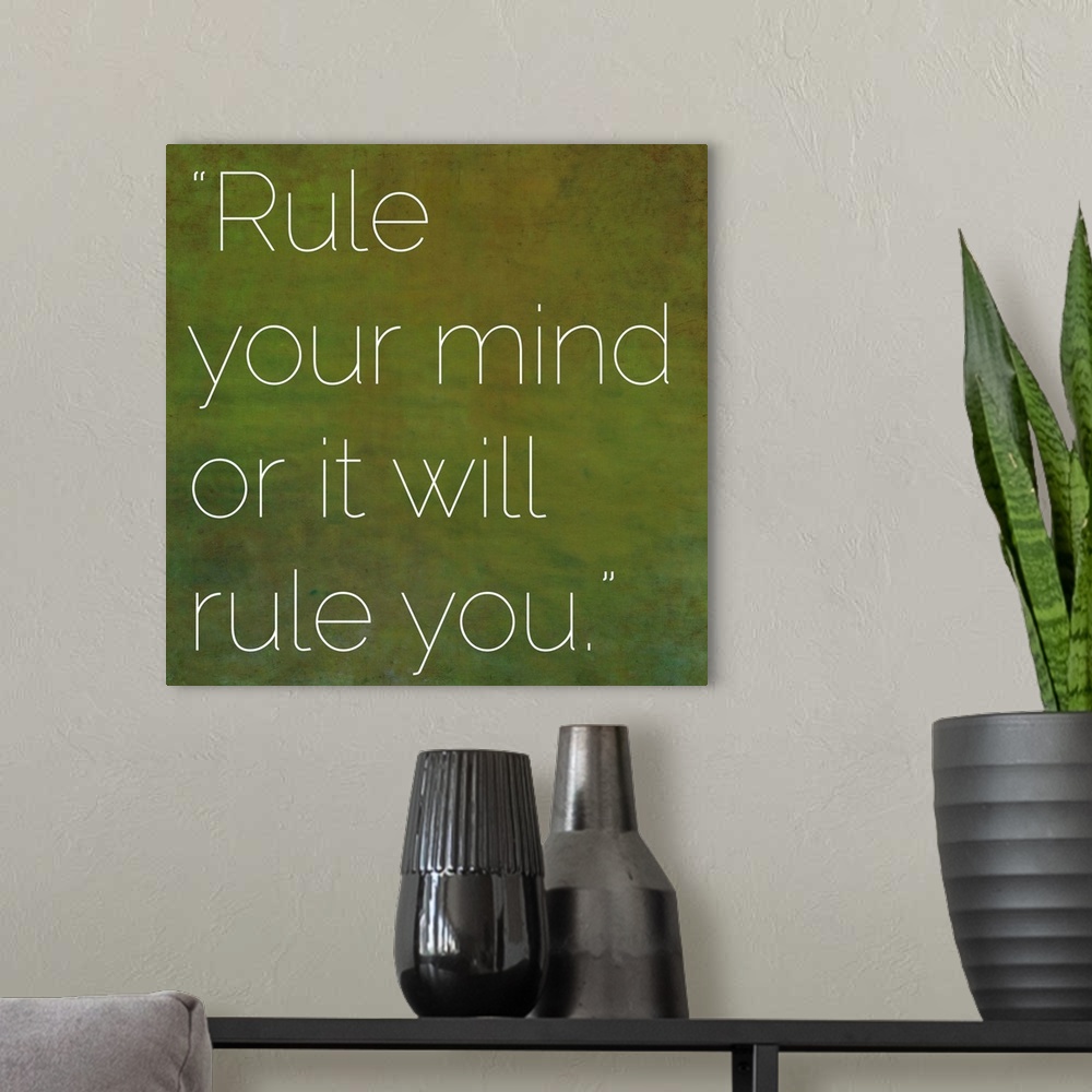 A modern room featuring Inspirational quote by Gautama Buddha (563 BC-483 BC) on earthy background