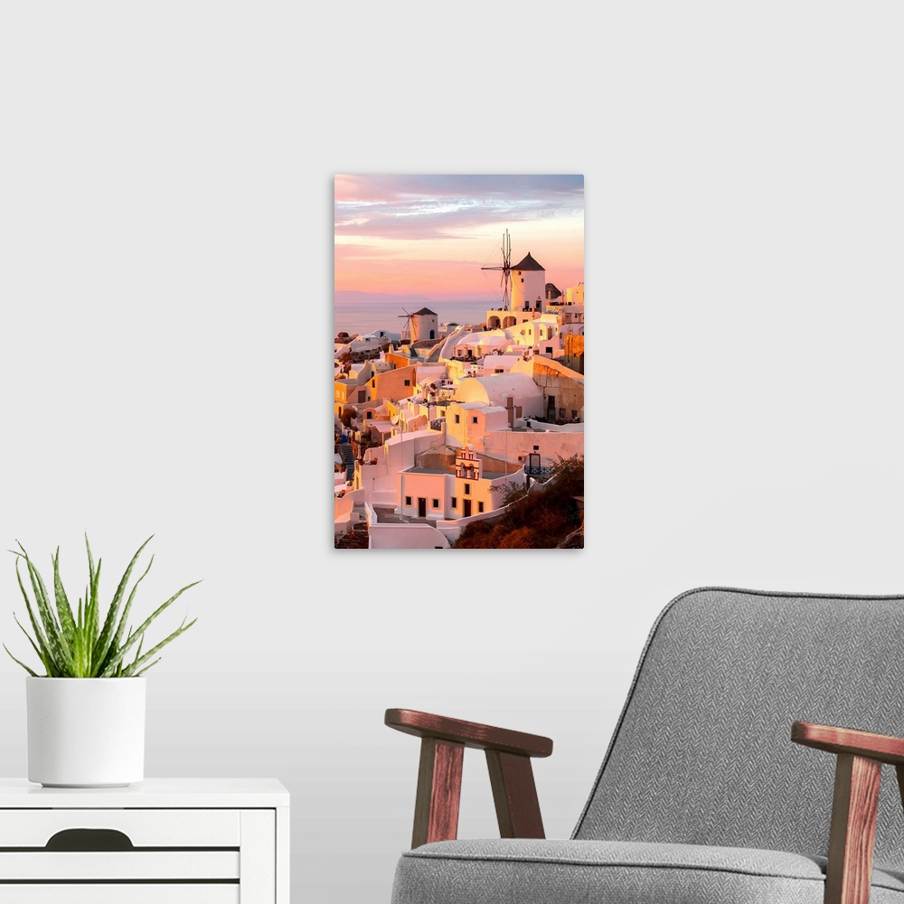 A modern room featuring Oia Santorini Greece famous with romantic and beautiful sunsets.
