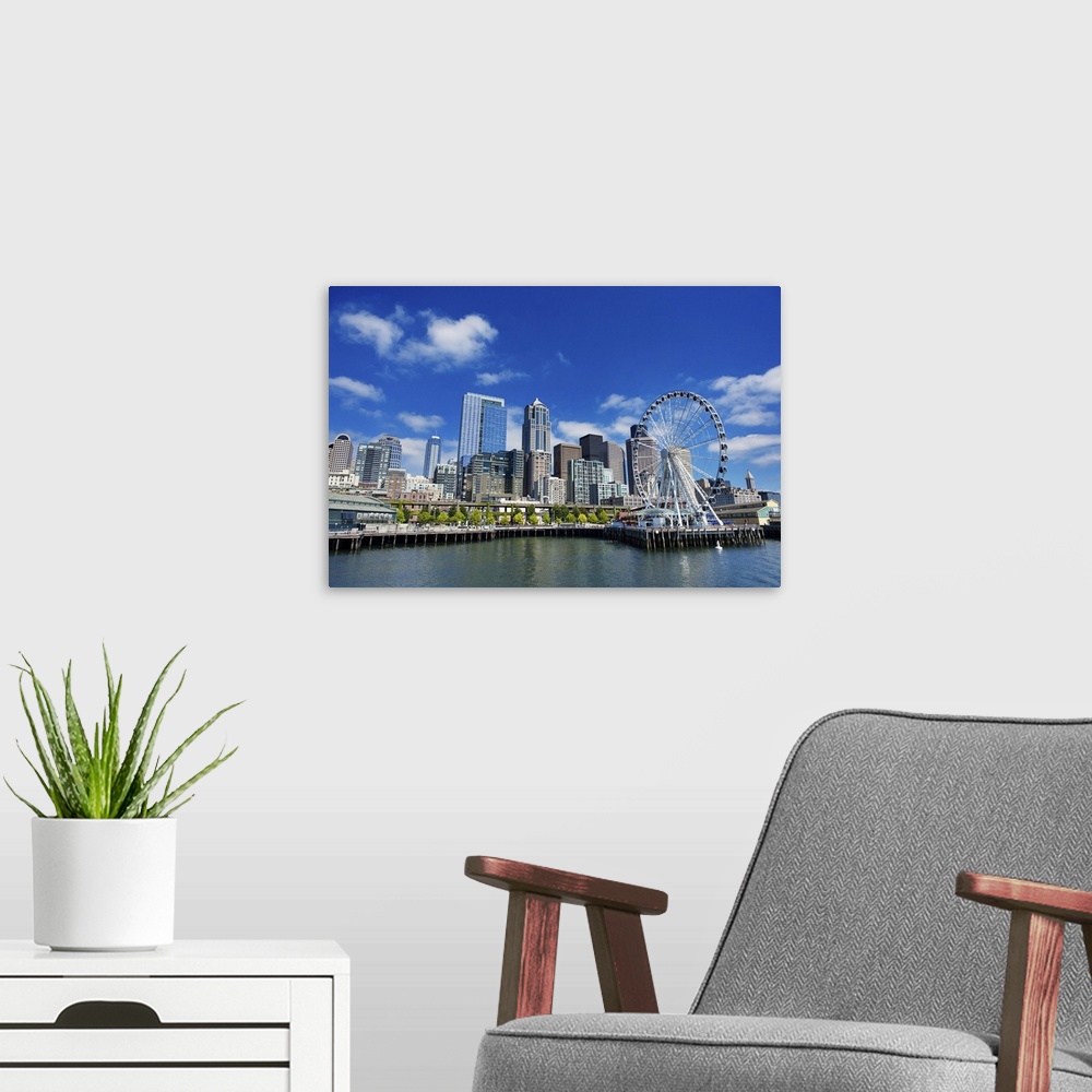 A modern room featuring Seattle Ferris Wheel, Skyline, And Waterfront Sunny Day With Blue Sky And Clouds