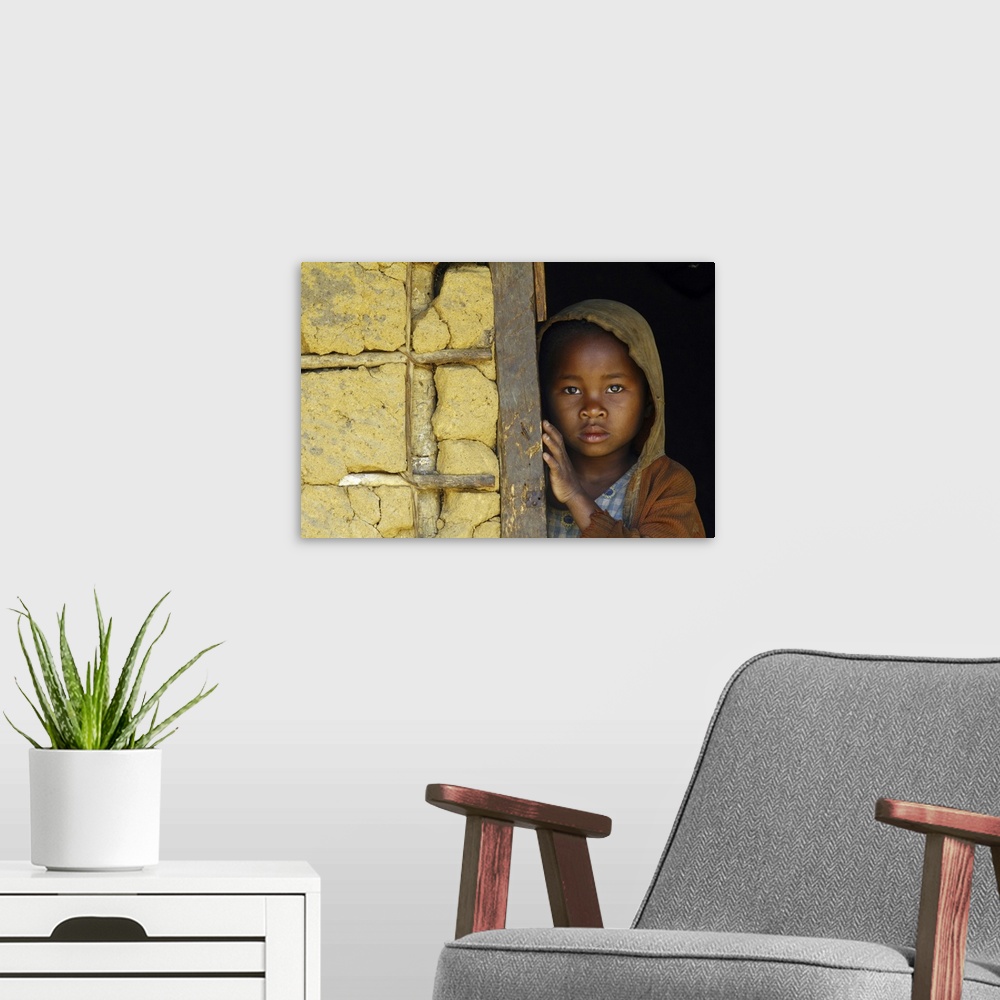 A modern room featuring Shy And Poor African Girl With Headkerchief, Madagascar