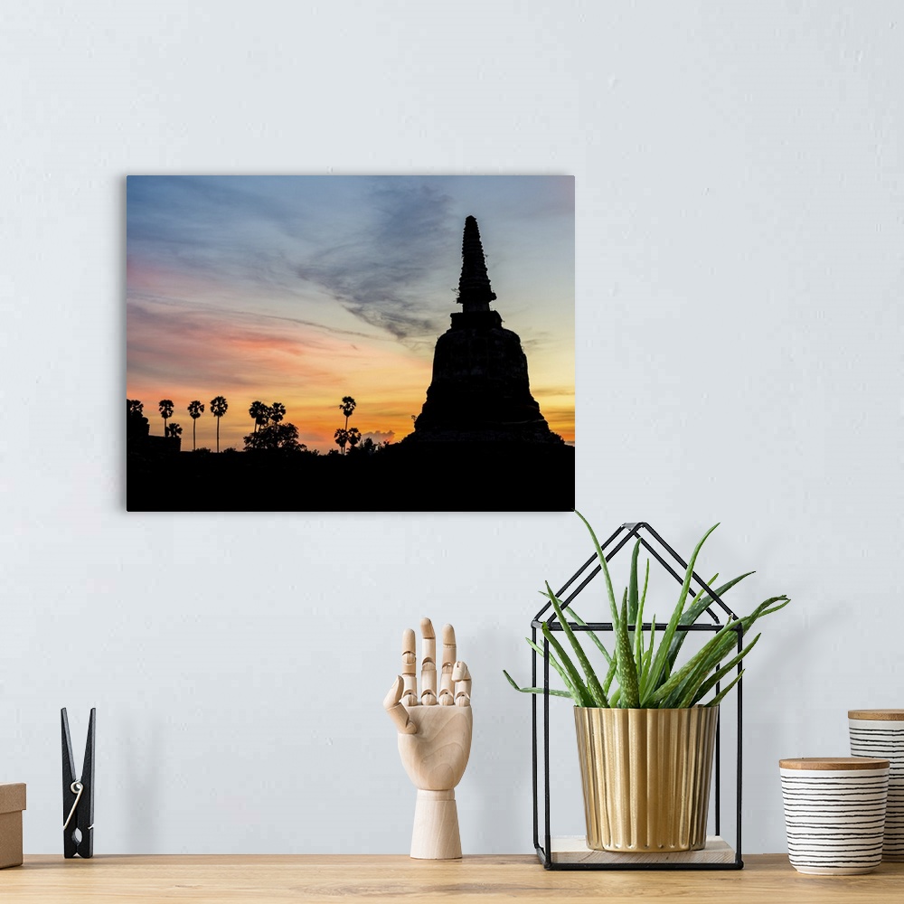 A bohemian room featuring Silhouette Of Buddha After Sunset In Ayutthaya, Thailand