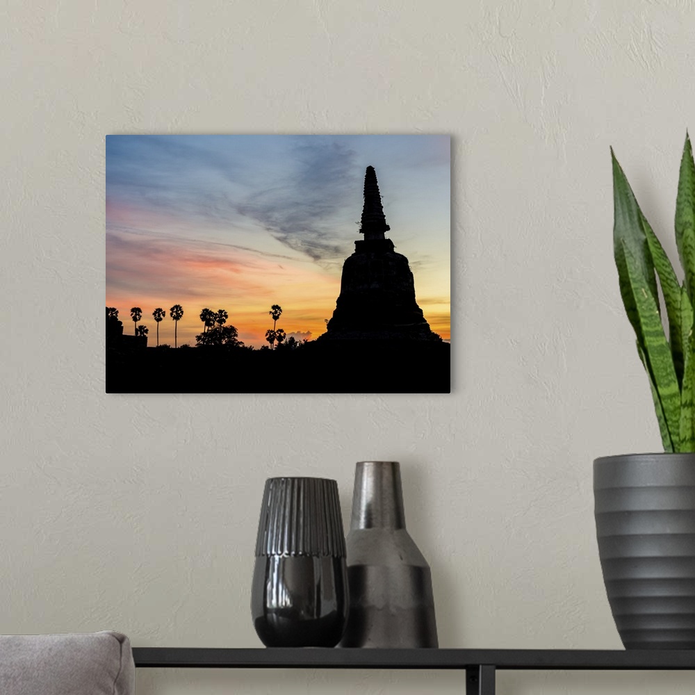 A modern room featuring Silhouette Of Buddha After Sunset In Ayutthaya, Thailand
