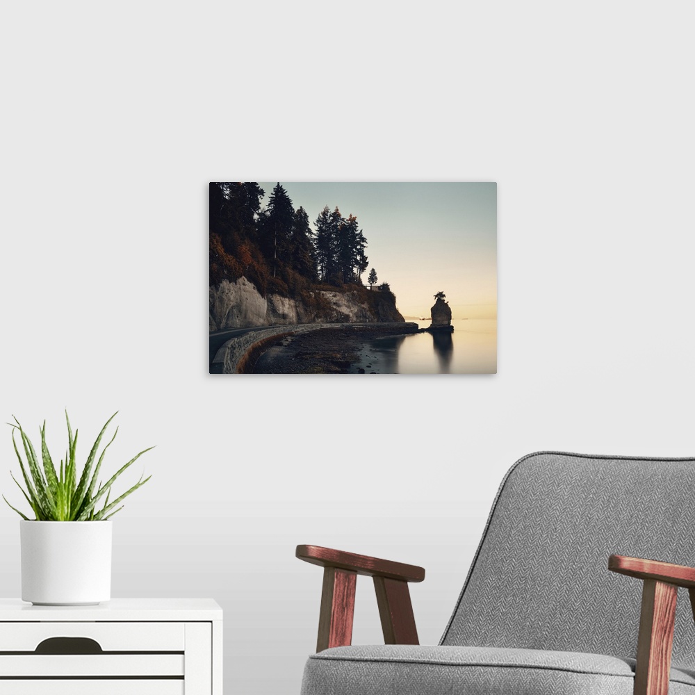 A modern room featuring Siwash Rock In Stanley Park At Sunrise In Vancouver