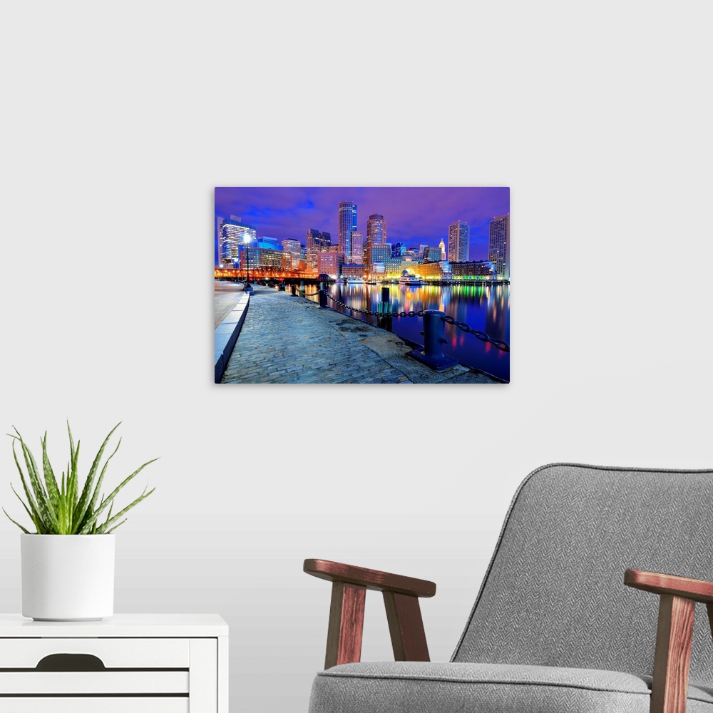 A modern room featuring Financial District of Boston, Massachusetts viewed from Boston Harbor.