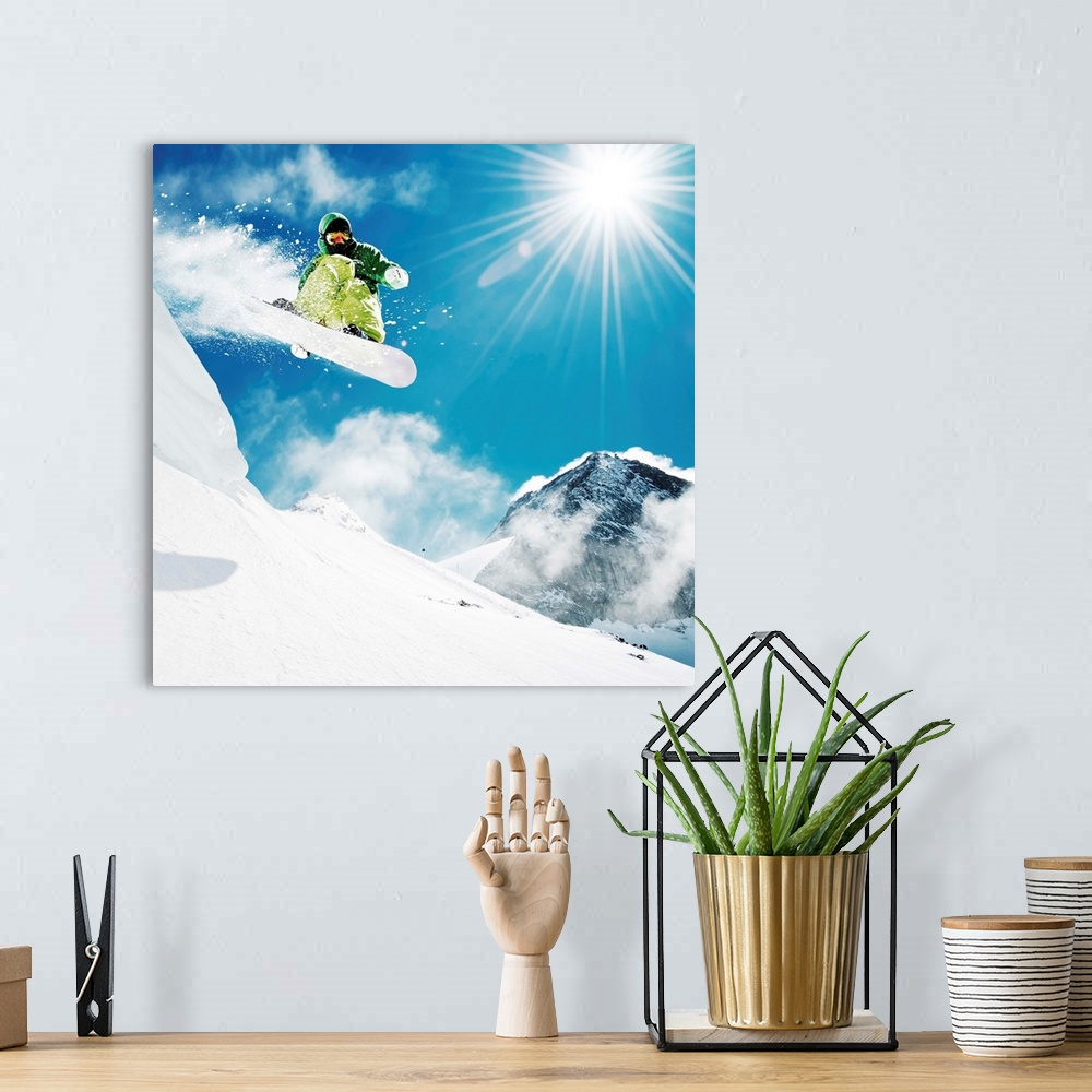 A bohemian room featuring Snowboarder at jump inhigh mountains at sunny day.