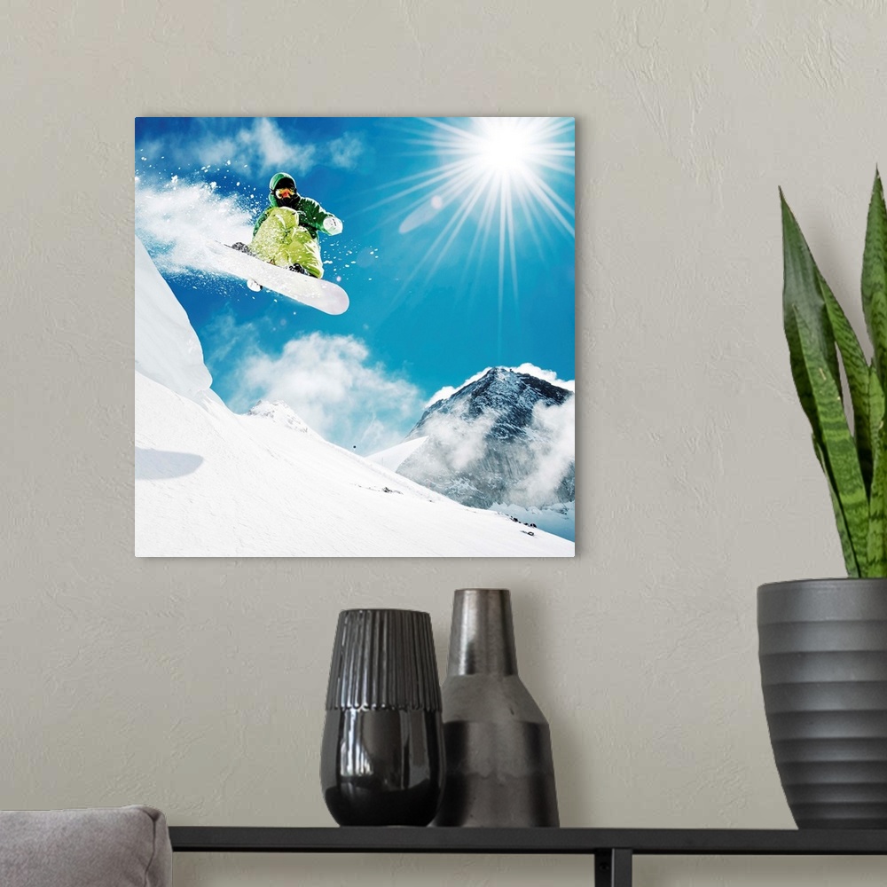 A modern room featuring Snowboarder at jump inhigh mountains at sunny day.