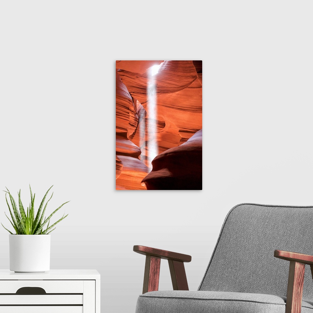 A modern room featuring Sunlight slipping through the tight cracks of Antelope Canyon, Arizona.