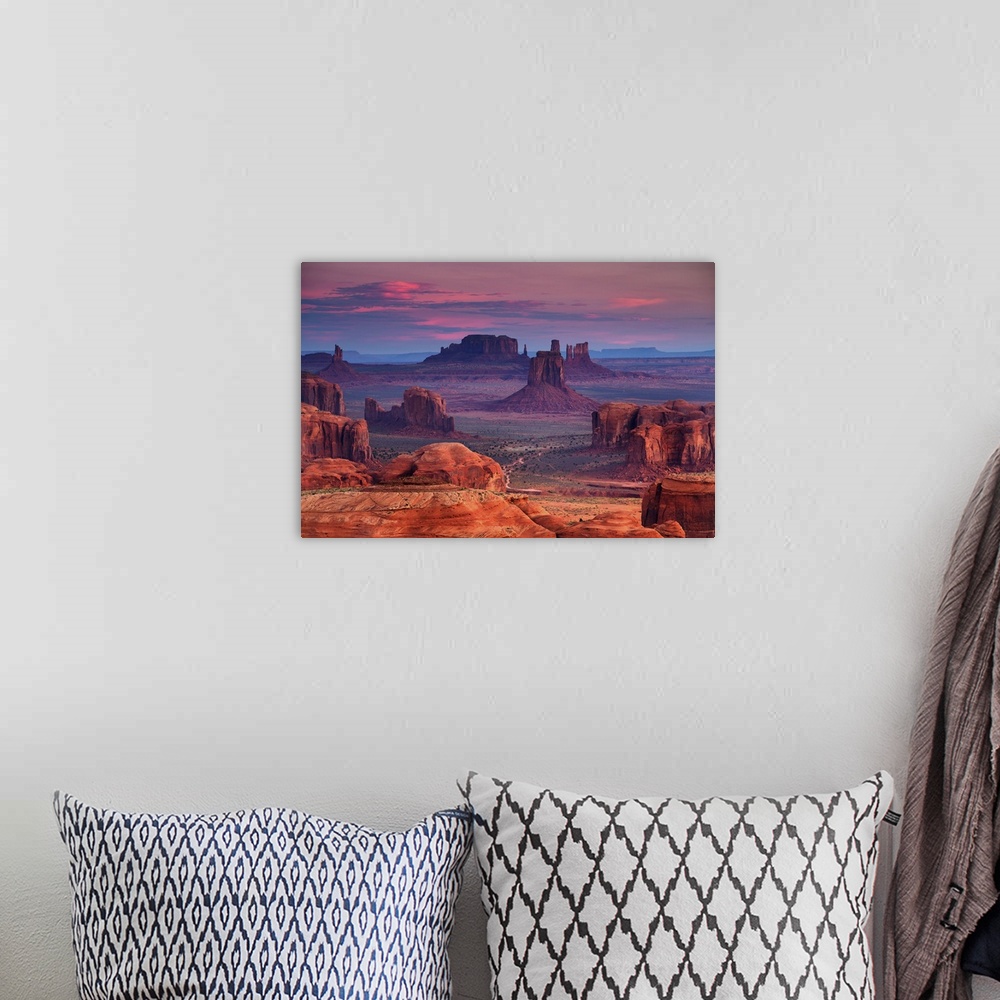 A bohemian room featuring Sunrise in Hunts Mesa. Navajo tribal majesty place near Monument Valley, Arizona.