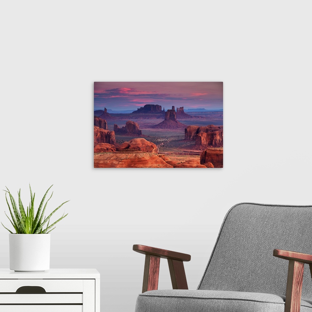 A modern room featuring Sunrise in Hunts Mesa. Navajo tribal majesty place near Monument Valley, Arizona.