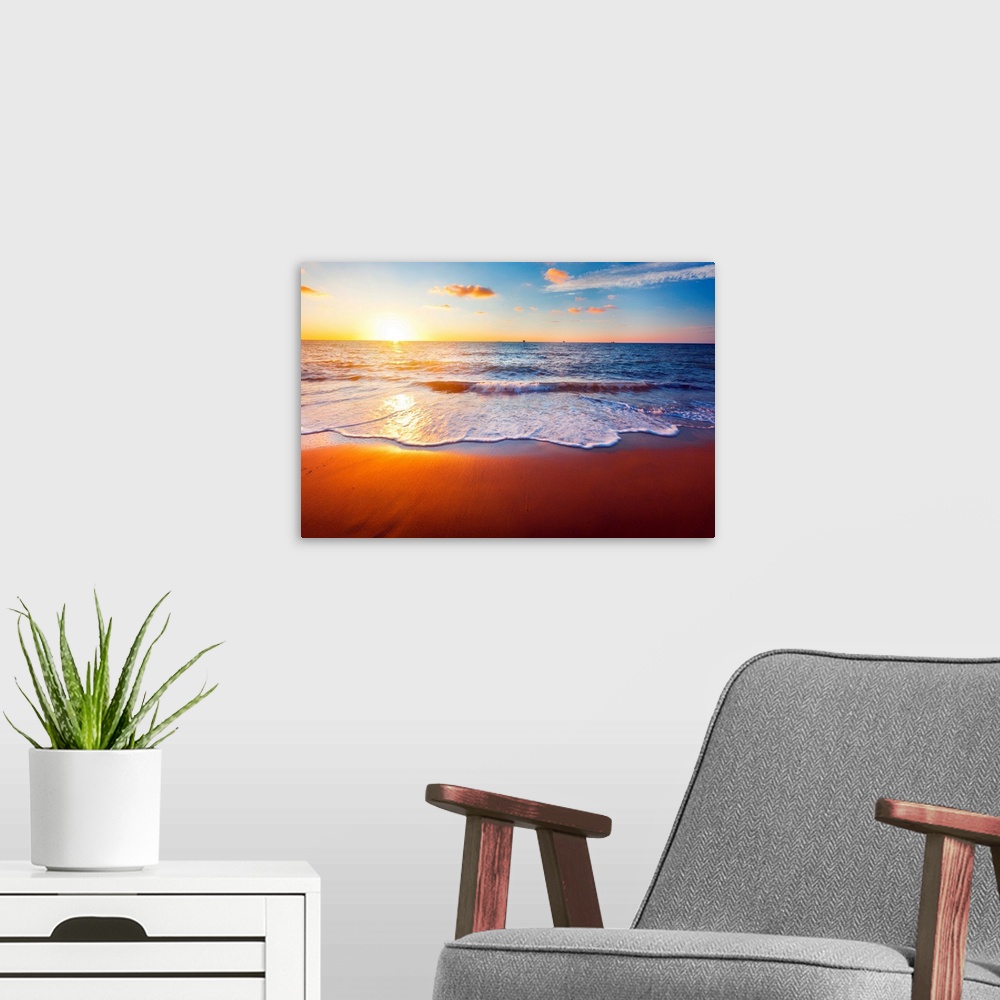 A modern room featuring sunset and beach