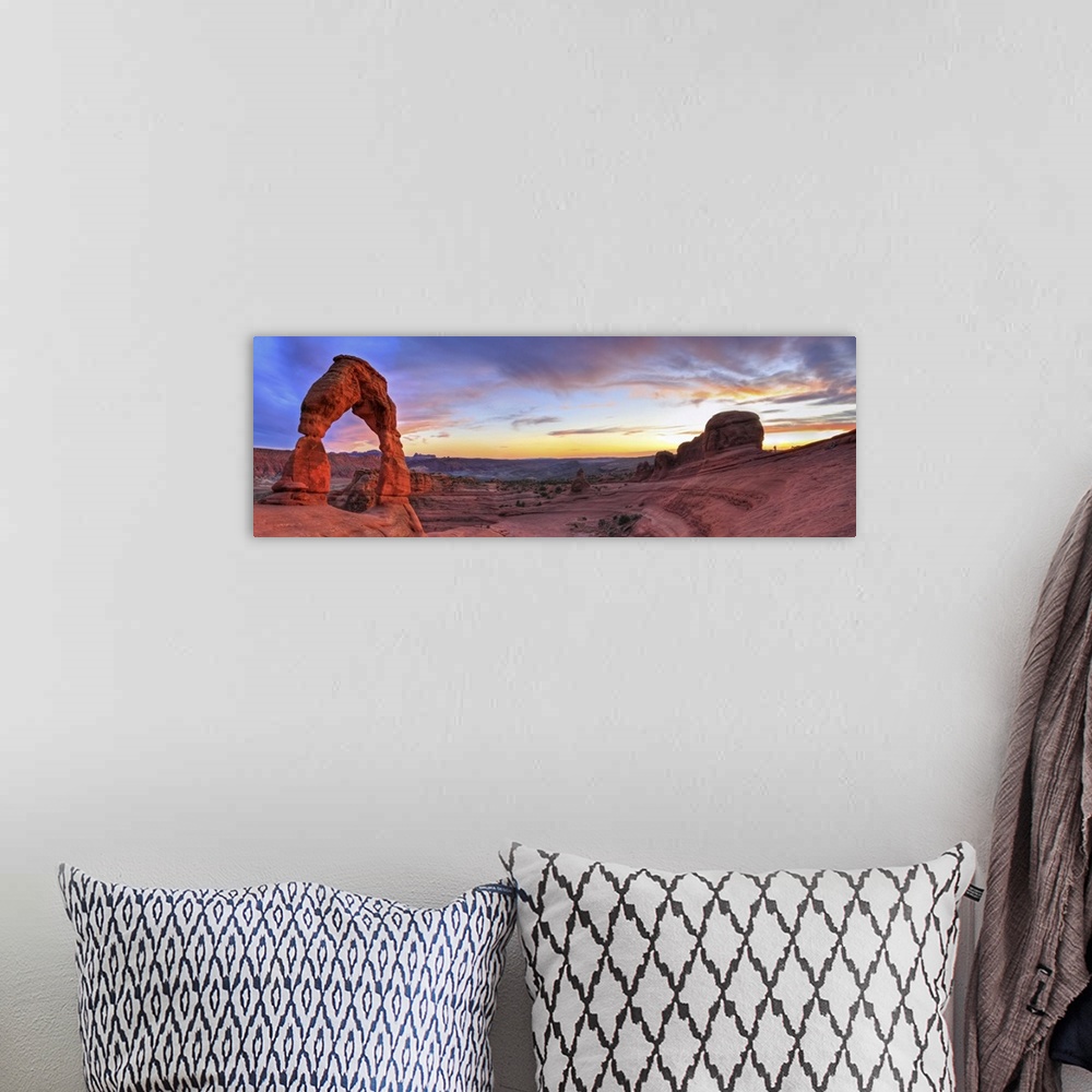 A bohemian room featuring Sunset Panoramic View Of Famous Delicate Arch In Arches National Park In Moab, Utah