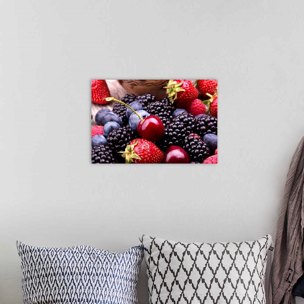 A bohemian room featuring Tasty Summer Fruits On A Wooden Table