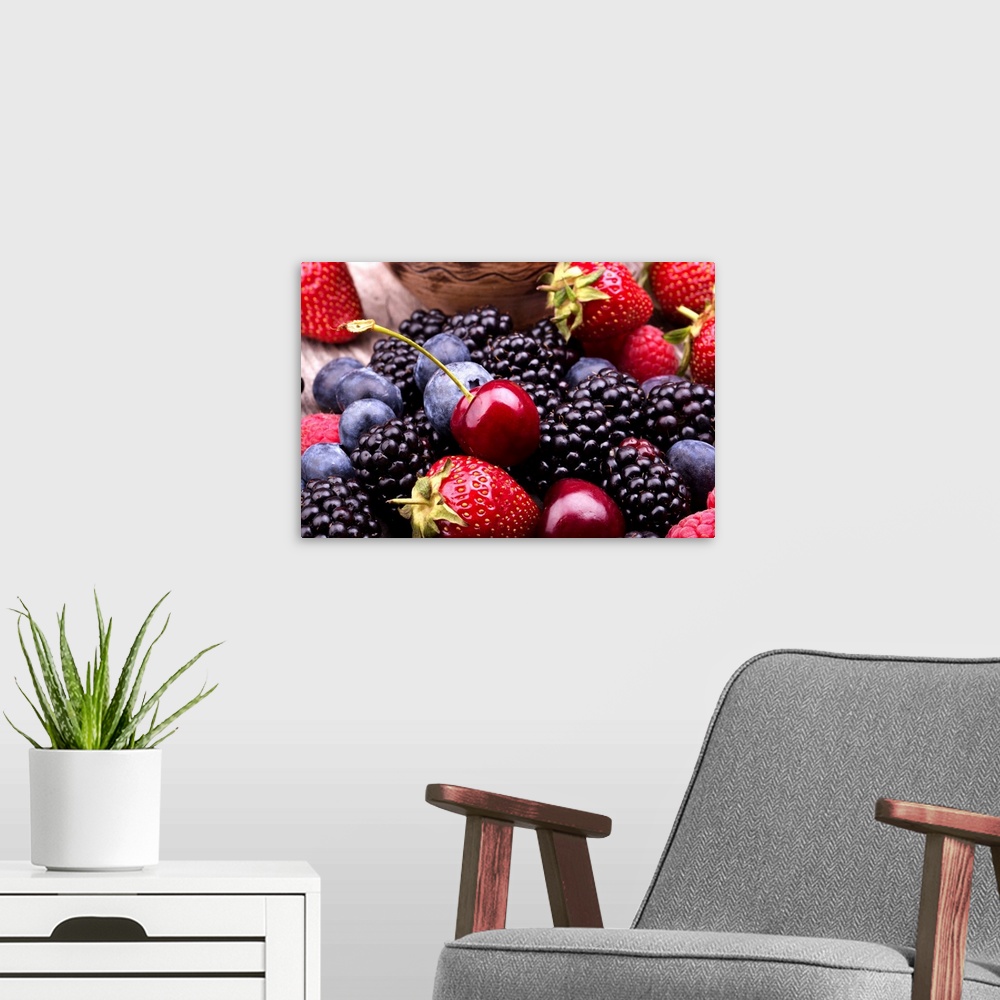 A modern room featuring Tasty Summer Fruits On A Wooden Table