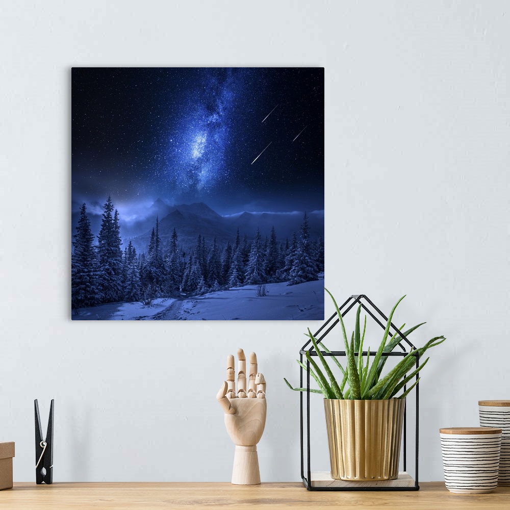 A bohemian room featuring Tatras Mountains in winter at night with falling stars, Poland.