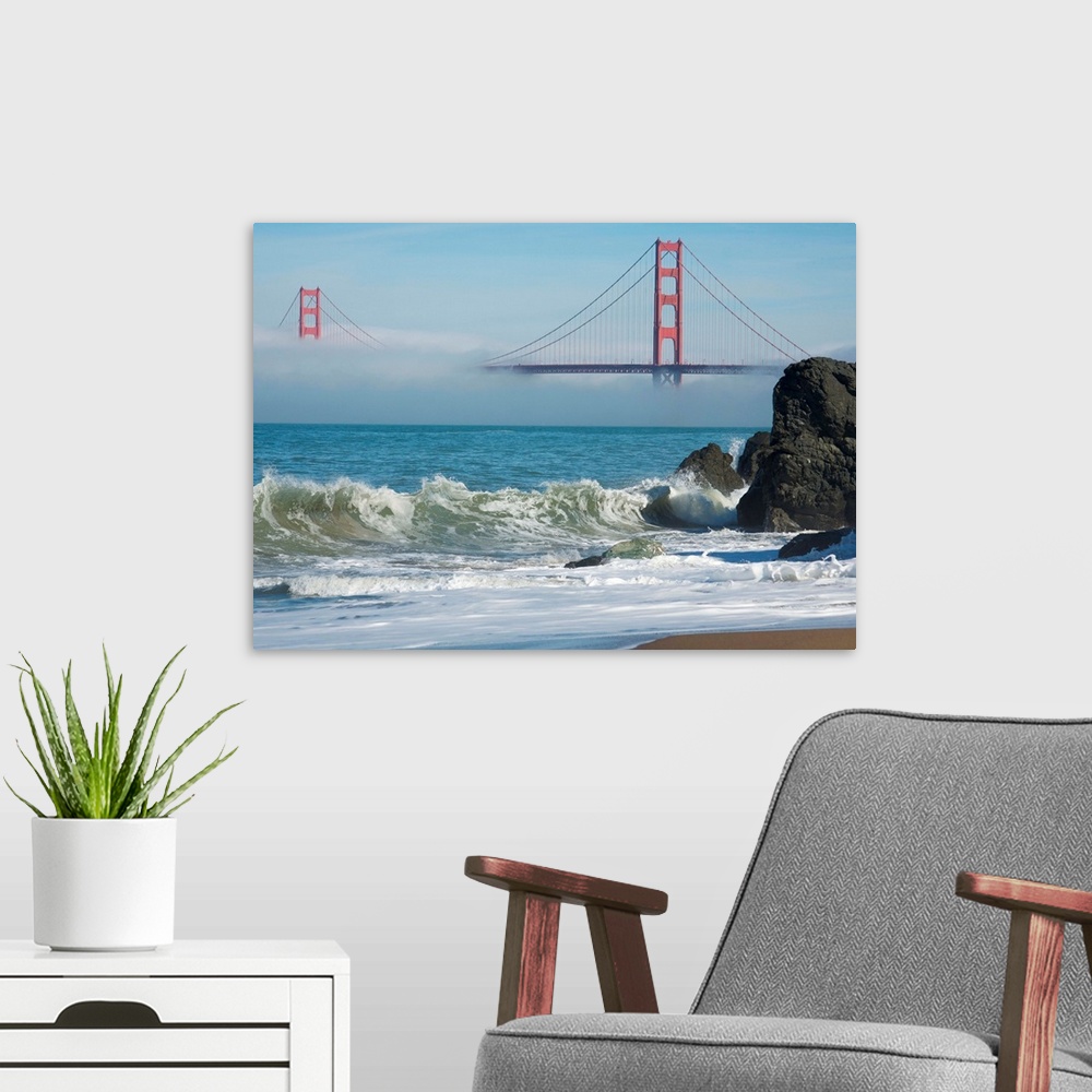 A modern room featuring The Golden Gate Bridge in the early morning fog. San Francisco, California, United States.
