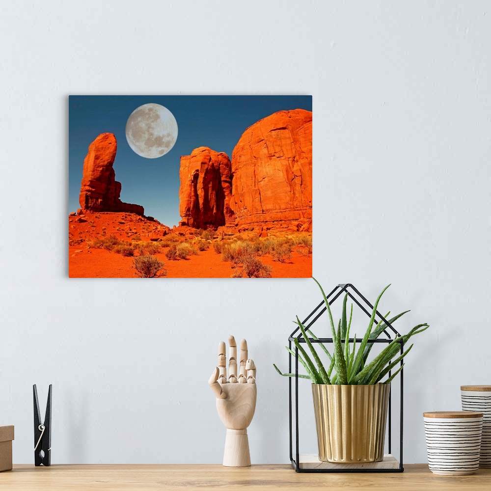 A bohemian room featuring Moon Over Monument Valley, Arizona.