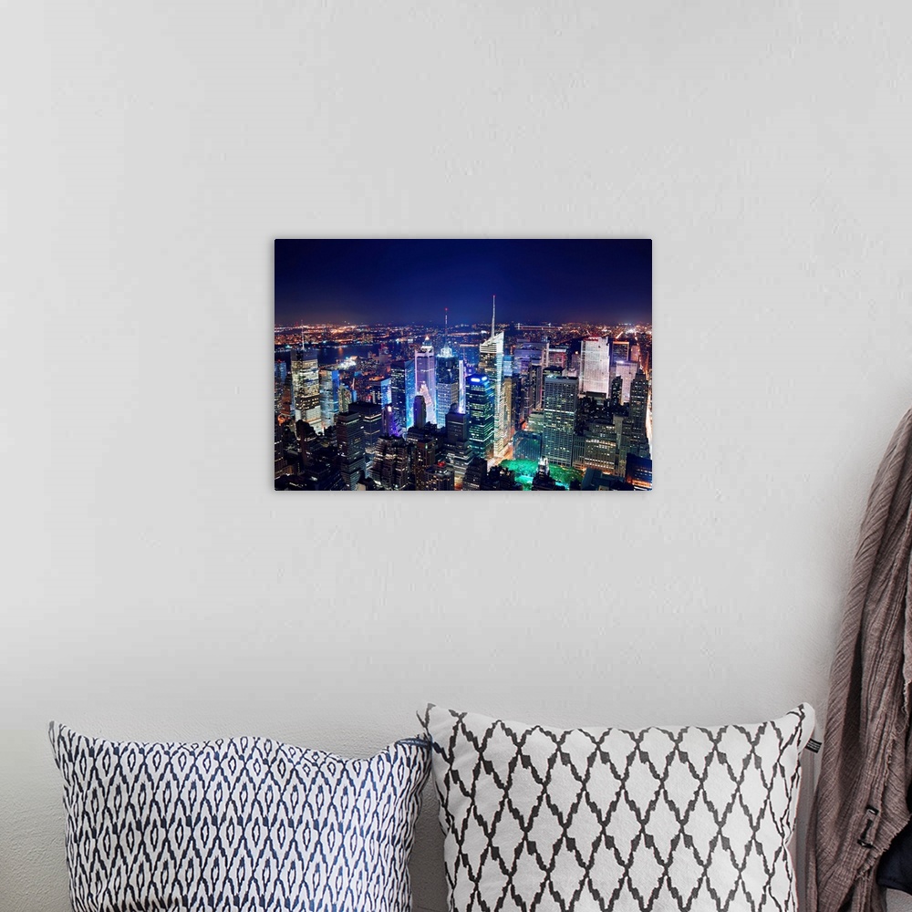 A bohemian room featuring New York City Manhattan Times Square panorama aerial view at night with office building skyscrape...