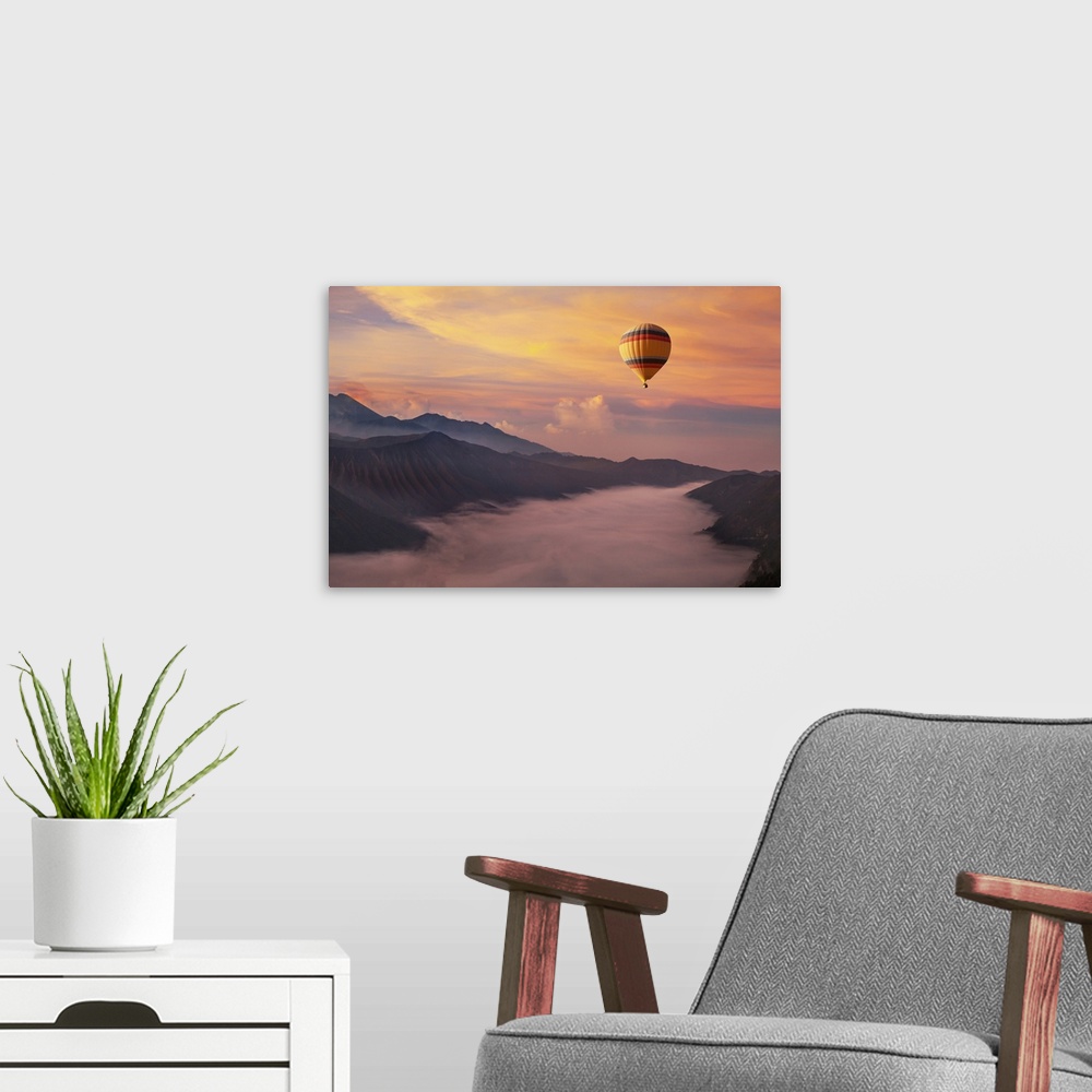 A modern room featuring Travel on hot air balloon, beautiful inspirational landscape with sunrise colorful sky.