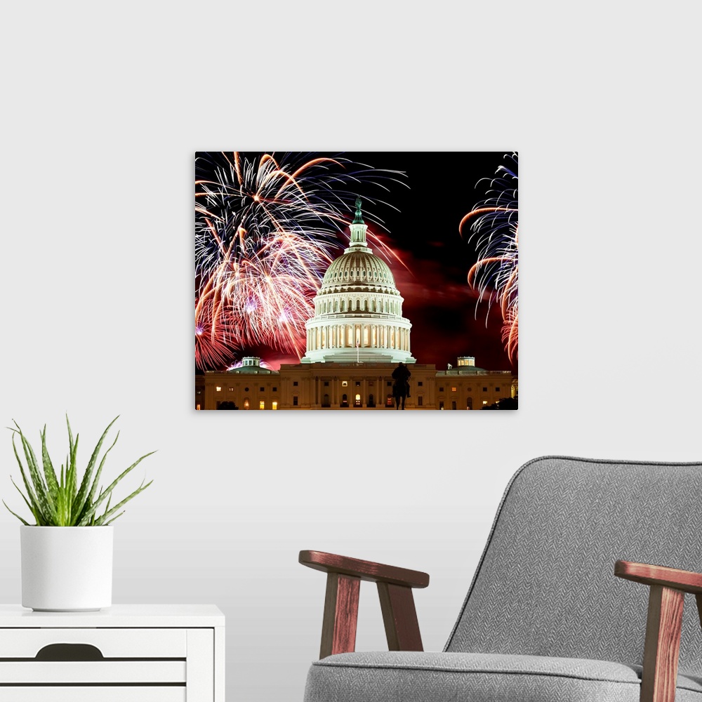 A modern room featuring United States Capitol Building under a display of fireworks.