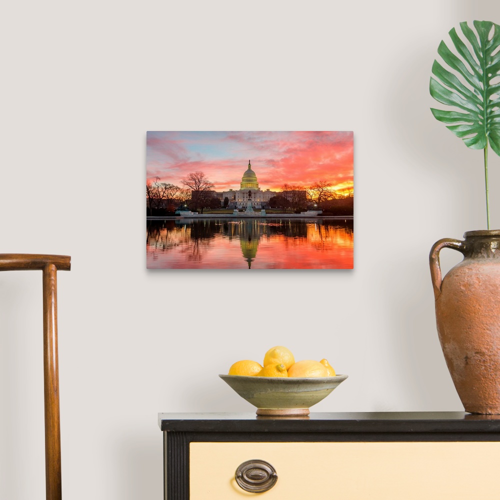 A traditional room featuring Washington DC, Capitol Building in a cloudy sunrise with mirrored reflection.