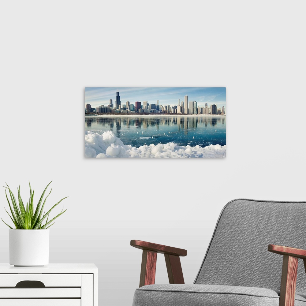 A modern room featuring Winter panorama of frozen Chicago.