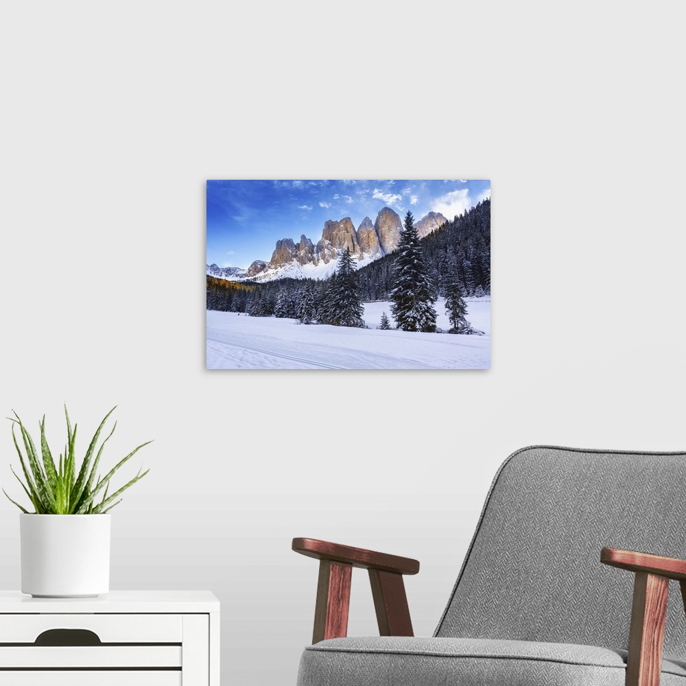 A modern room featuring Winter Views Of The Geisler Mountain Peaks In The Val Di Funes, Italy
