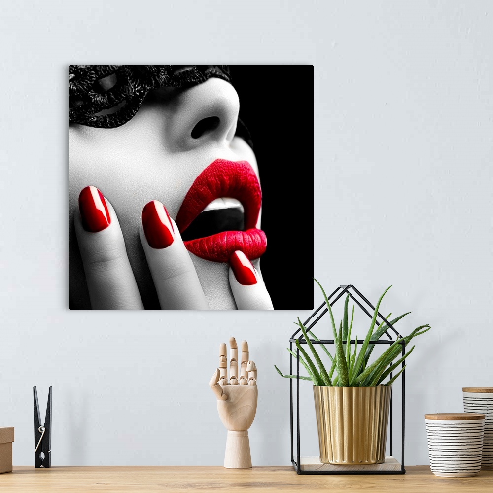 A bohemian room featuring Beautiful Woman with Black Lace mask over her Eyes. Red Sexy Lips and Nails closeup. Open Mouth. Man