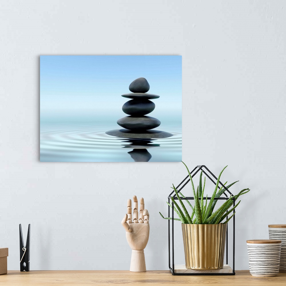 A bohemian room featuring Zen stones in water