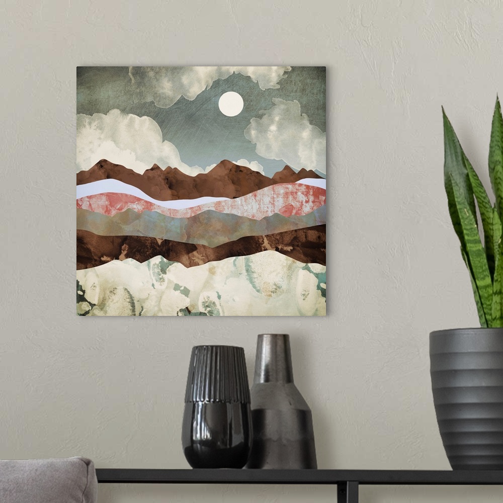 A modern room featuring Abstract depiction of a landscape with mountains, clouds, brown and pink.