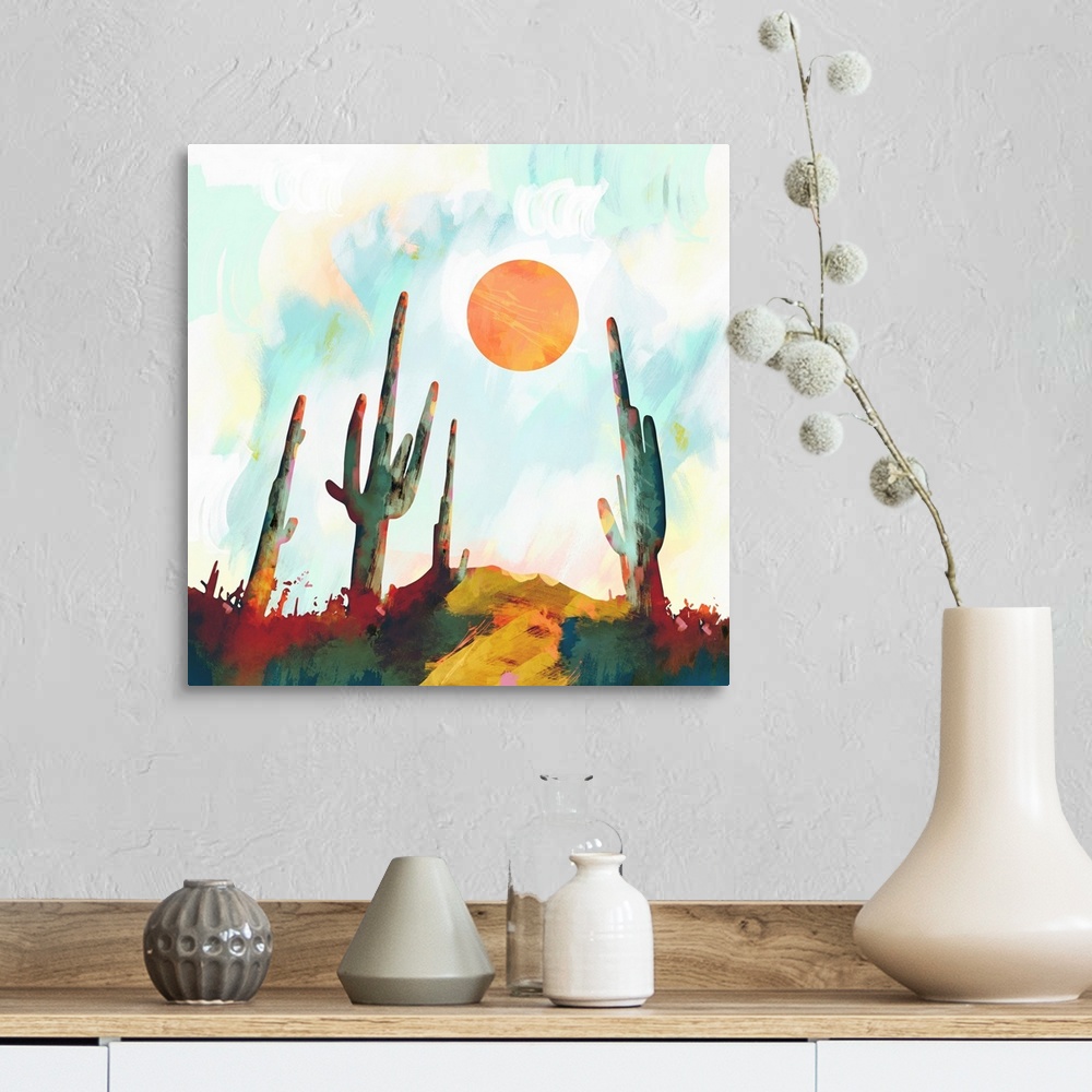 A farmhouse room featuring Abstract depiction of a desert landscape with cactus, sun, blue and orange.