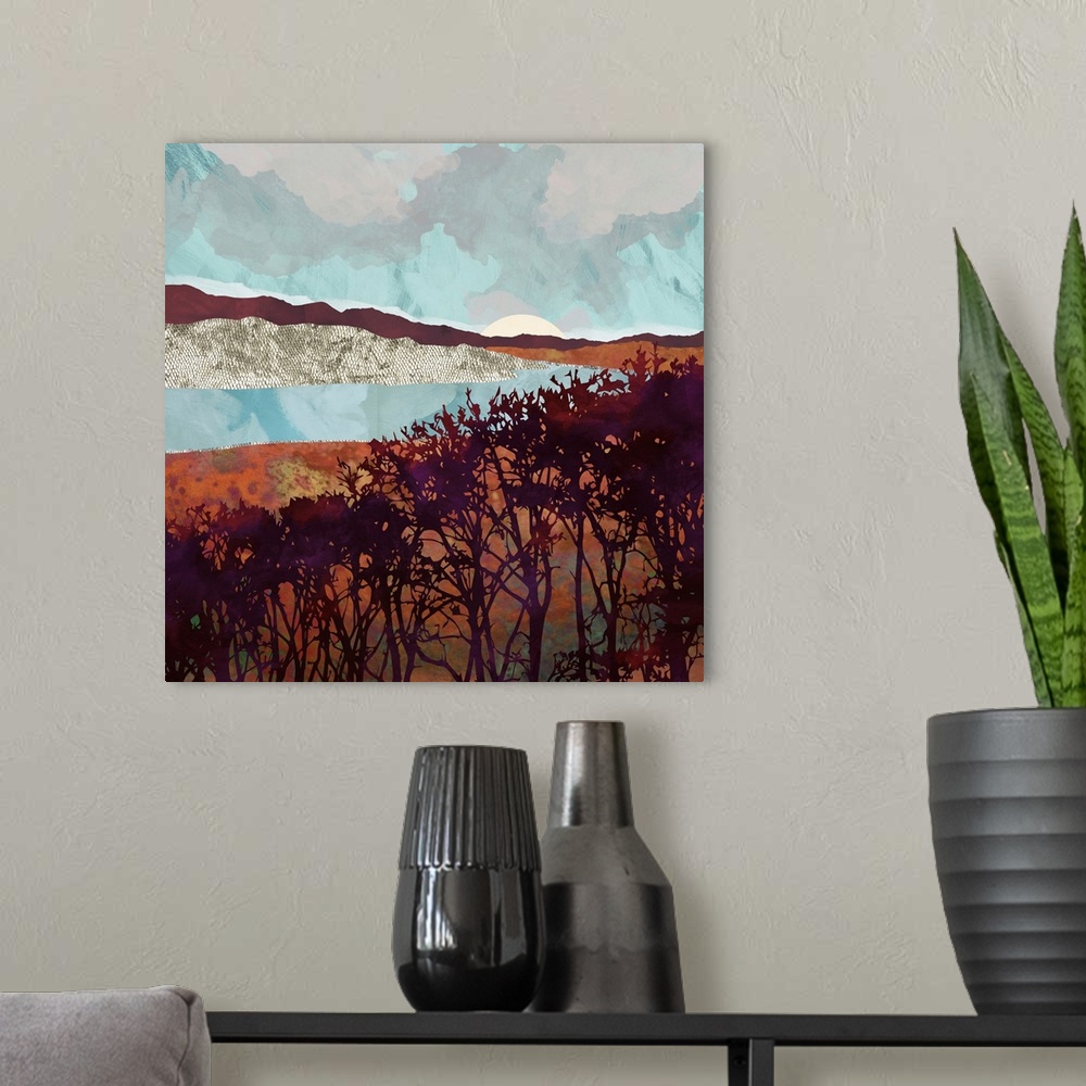 A modern room featuring Abstract depiction of fall foliage with trees, blue, orange, brown and red.