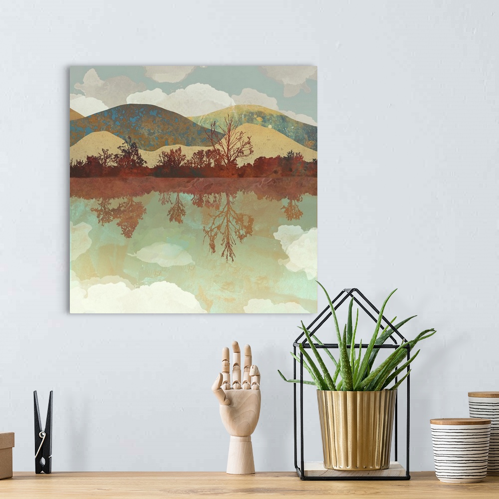 A bohemian room featuring Abstract depiction of a landscape with water, mountains, trees and clouds.