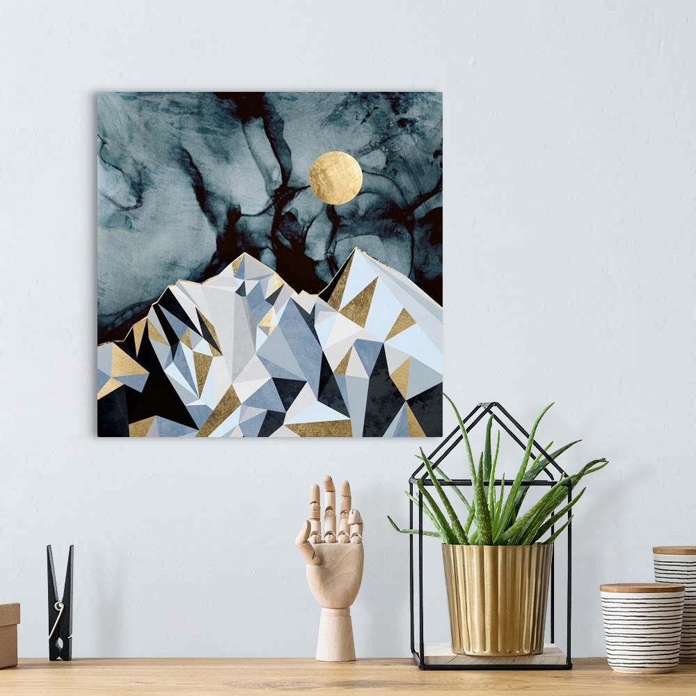 A bohemian room featuring Abstract depiction of mountain peaks at midnight with gold, grey and blue.