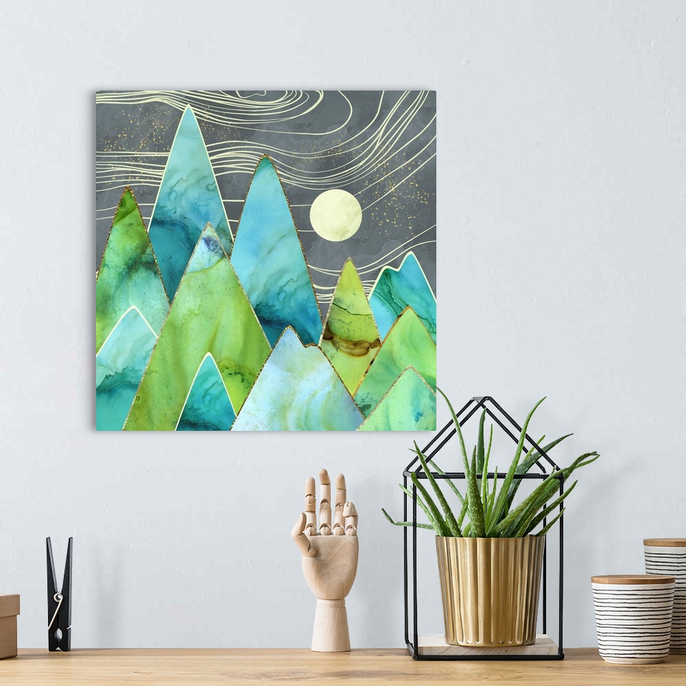 A bohemian room featuring Abstract depiction of moonlit mountains with gold, teal, green, blue and grey.