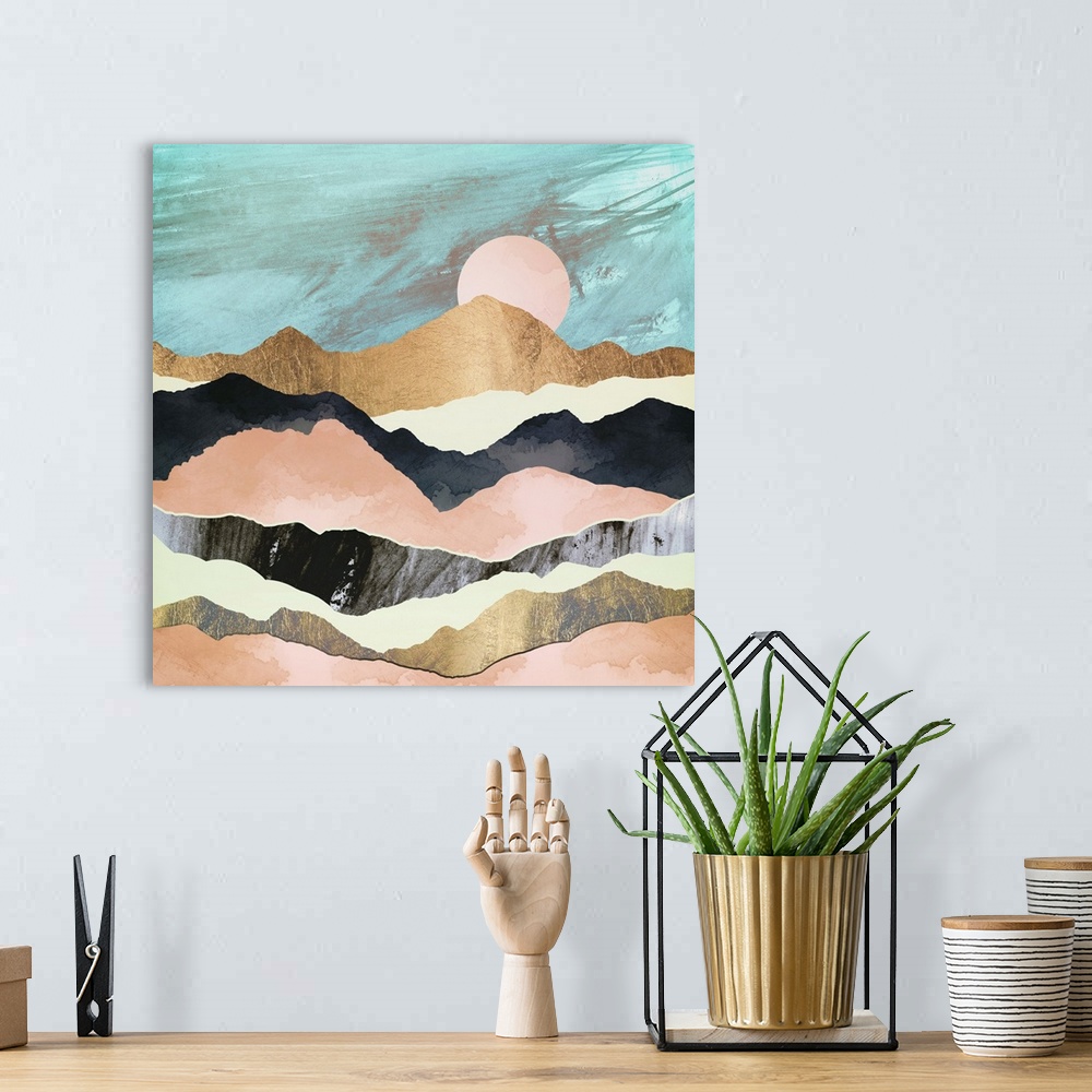 A bohemian room featuring Abstract depiction of pink mountains with gold, yellow, black and teal.
