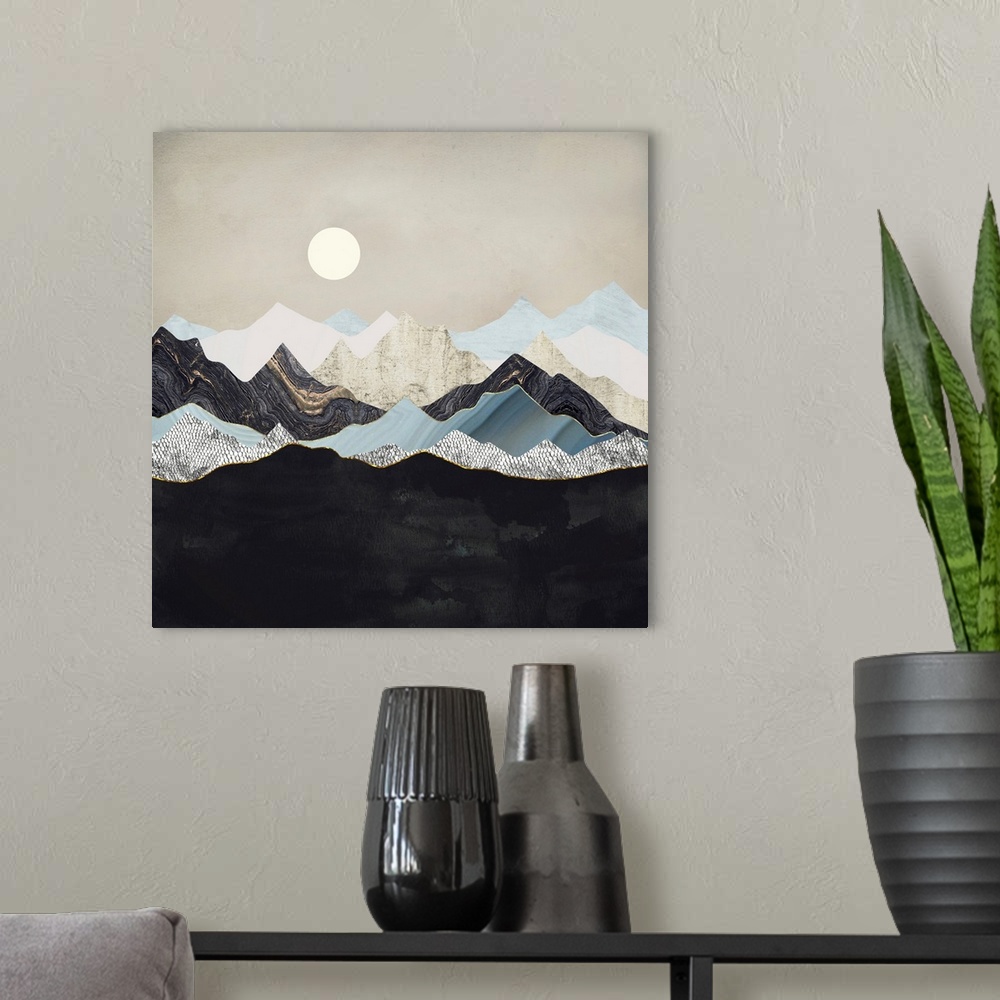 A modern room featuring Abstract landscape depicting silent dusk with mountains, gold, silver and blue.