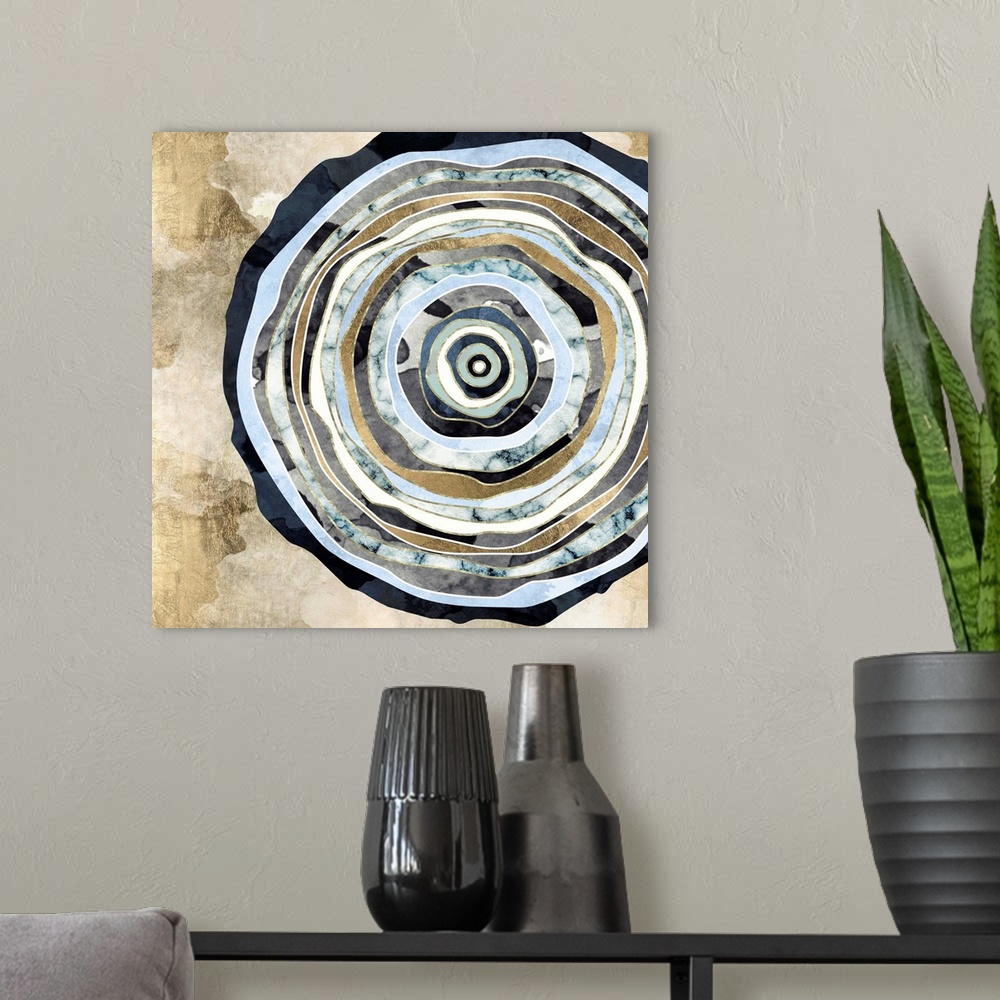 A modern room featuring Abstract depiction of a wood slice with texture, blue, gold and ivory.