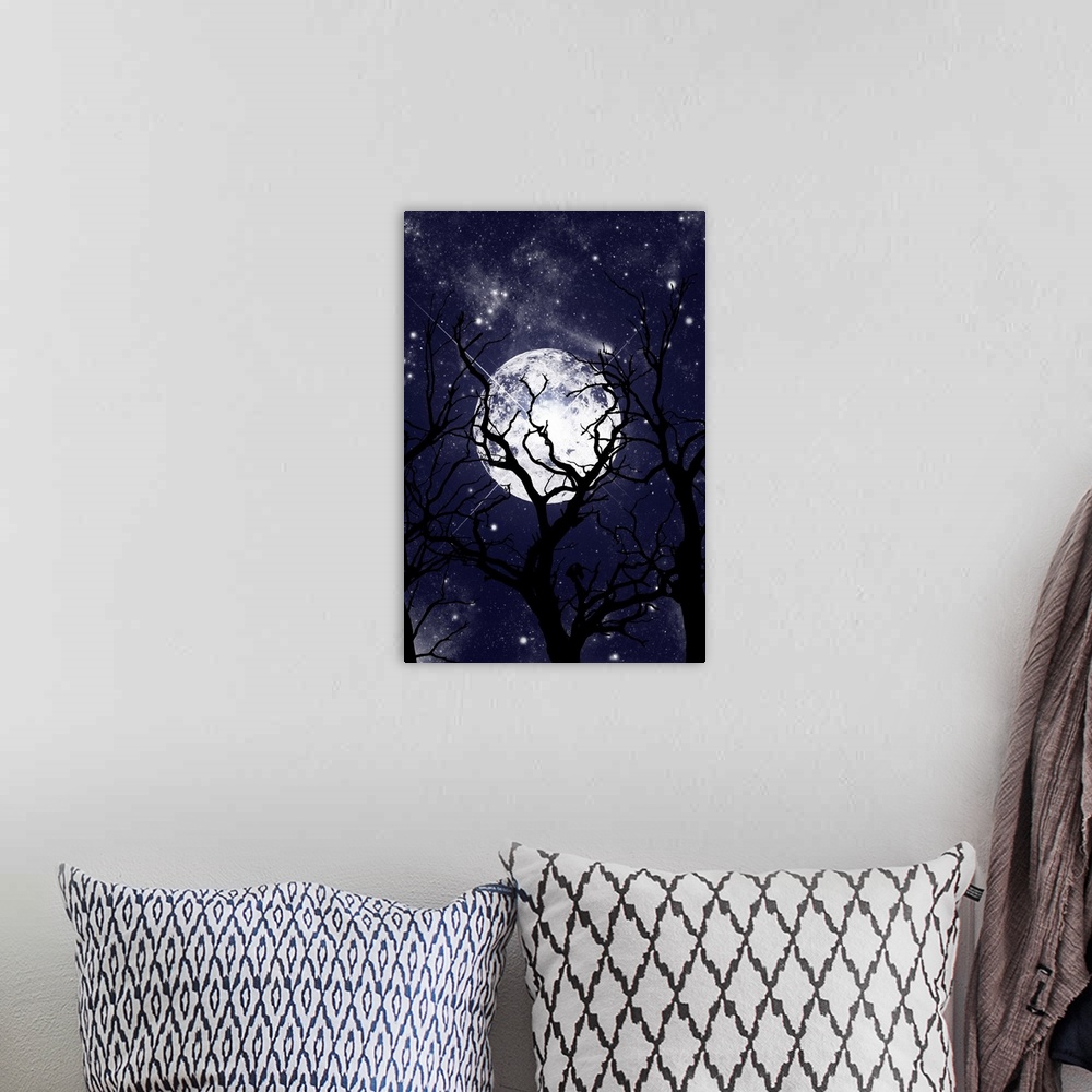 A bohemian room featuring Silhouettes of bare trees in front of a large full moon and a night sky full of stars.