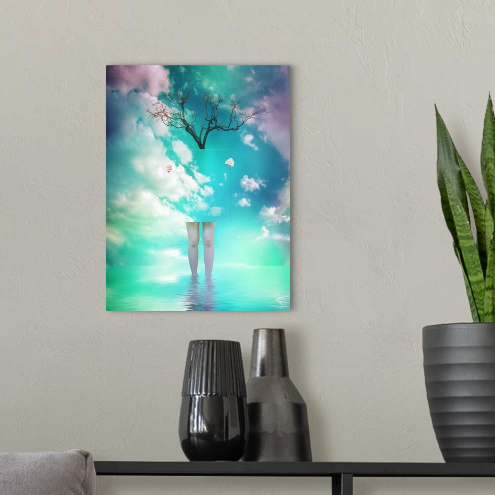 A modern room featuring Surreal image of a woman holding a panel of sky with branches overhead.