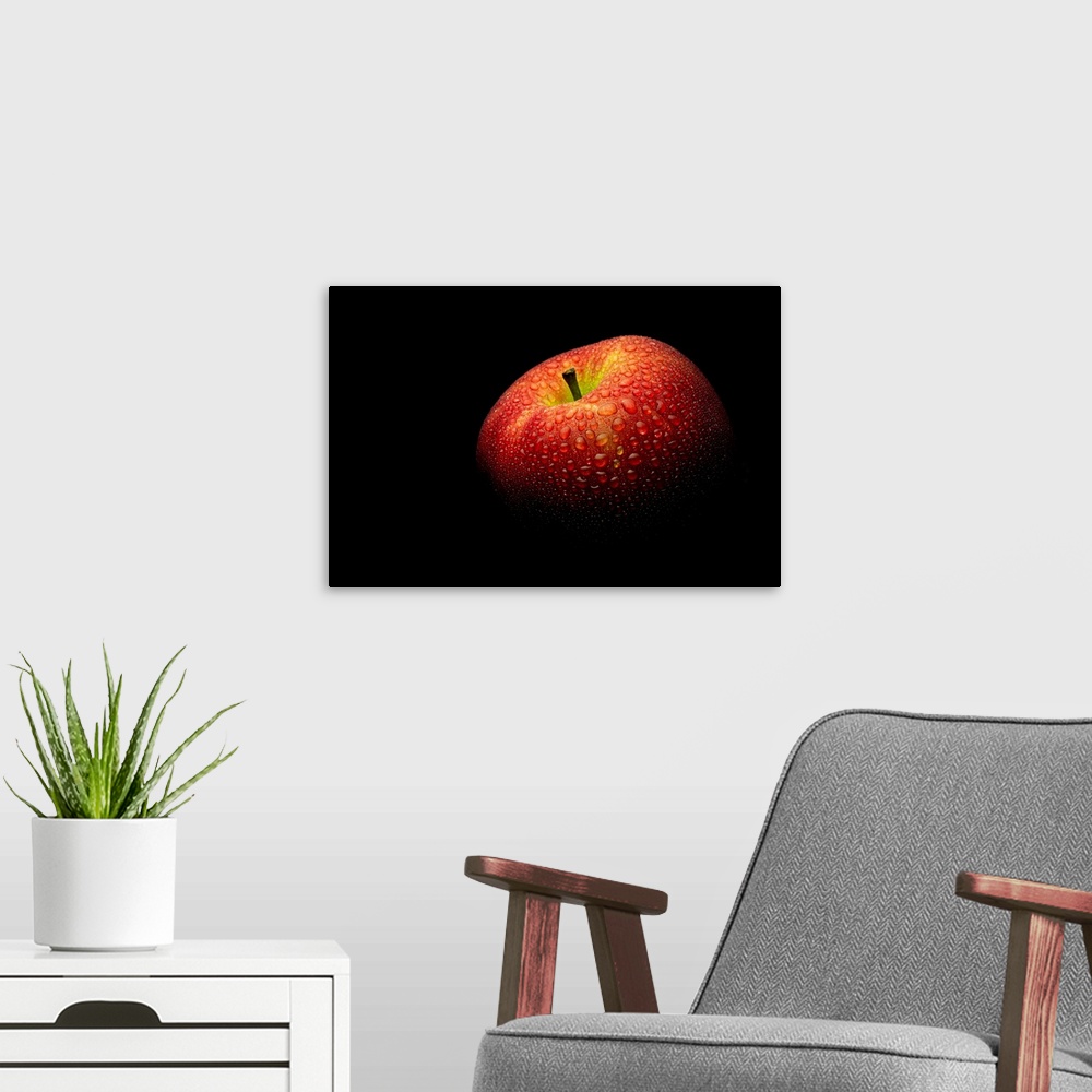 A modern room featuring A close up photograph of a fresh Honeycrisp apple with waterdrops.