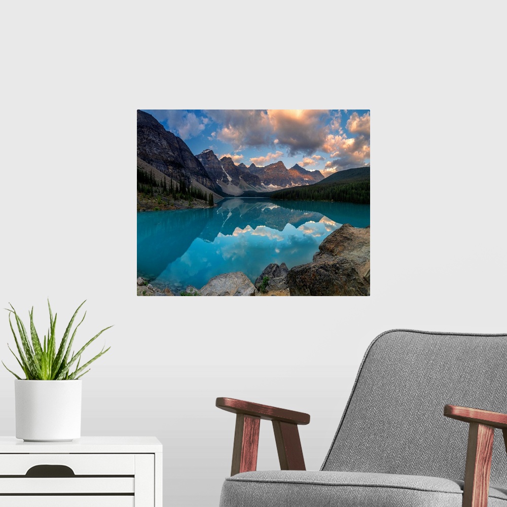 A modern room featuring A sunrise refelection on Moraine Lake in the Canadian Rocky Mountains.