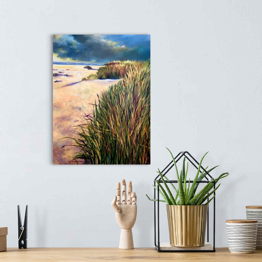 A bohemian room featuring This piece is painted with muted colors in the sky and brighter colored strokes for the grass in ...