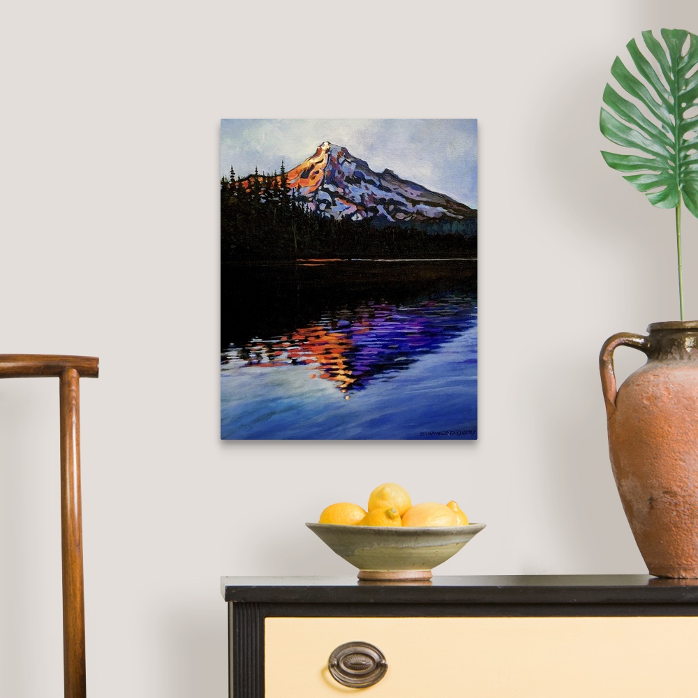 A traditional room featuring This is beautiful Mountain in Oregon, reflecting into Lost Lake. The bright warm colors on the co...