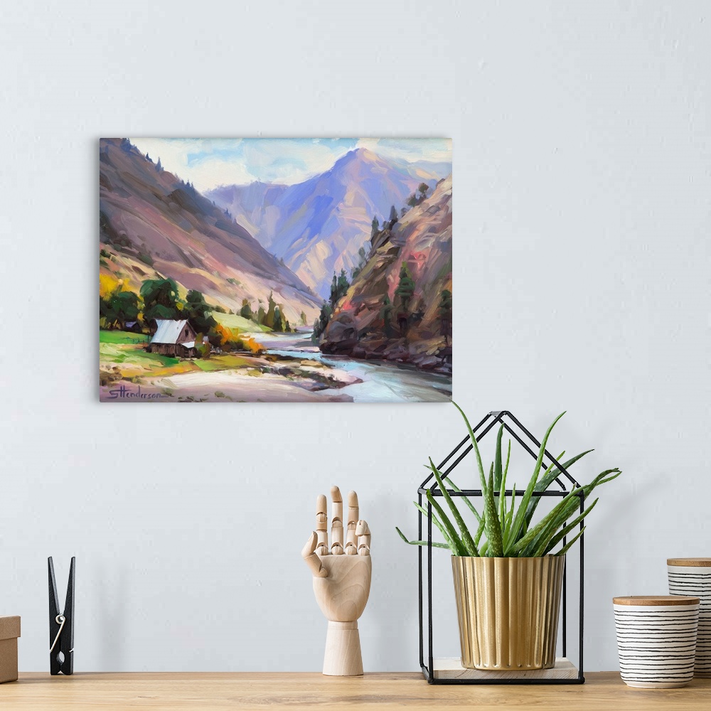 A bohemian room featuring Traditional impressionist landscape painting of a rural homestead along a wilderness river in Idaho.