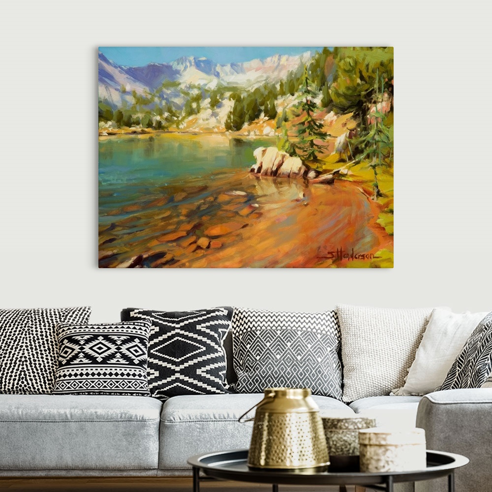 A bohemian room featuring Traditional impressionist landscape painting of an alpine wilderness lake. It is calm, quiet, and...
